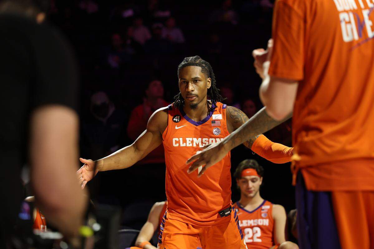 Clemson guard Jestin Porter (1) runs out during pregame intros before the Tigers played No. 10 BYU in the 2025 Jimmy V Classic. The Tigers spent just over 24 hours in New York for the game.