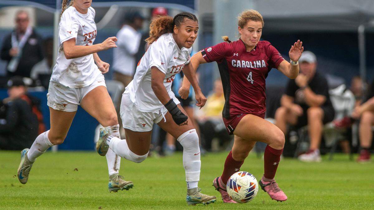 South Carolina's Katie Shea Collins battles for the ball against Texas in a 2024 SEC Tournament championship game.