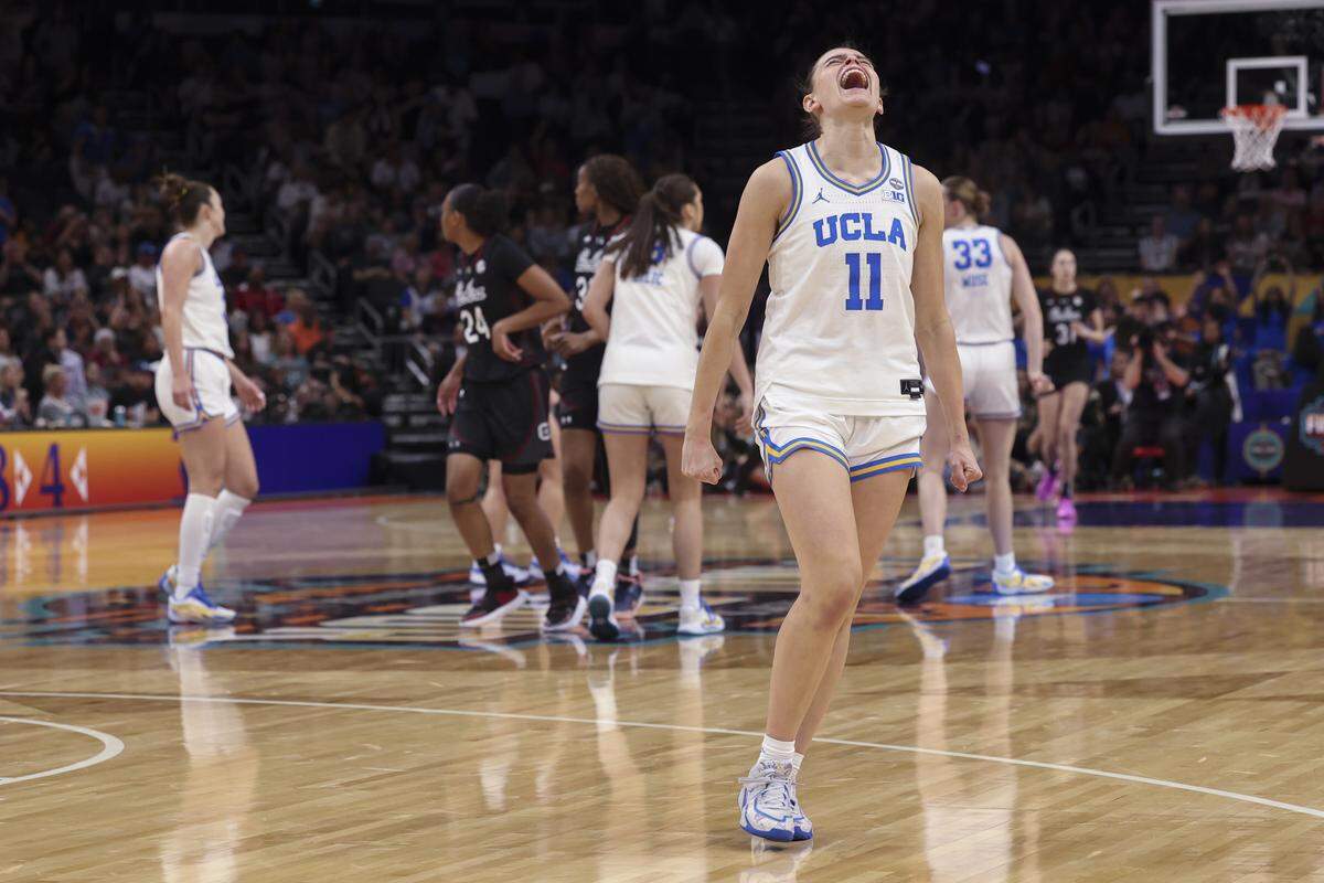 UCLA’s Gabriela Jaquez (11) celebrates as the game comes to a close as the UCLA Bruins win the NCAA national championship at Mortgage Matchup Center in Phoenix on Sunday, April 5,2026.