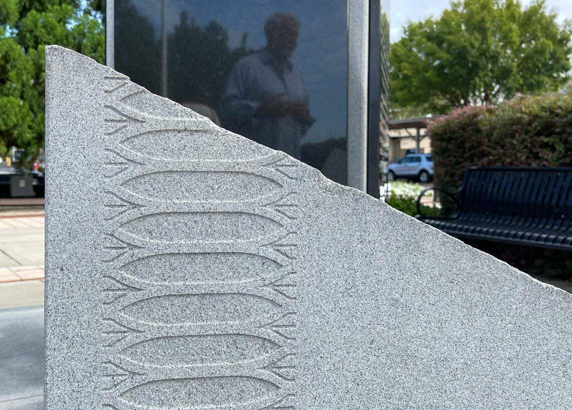 The engraving on the pieces of granite are symbolic of the windows in the World Trade Center.