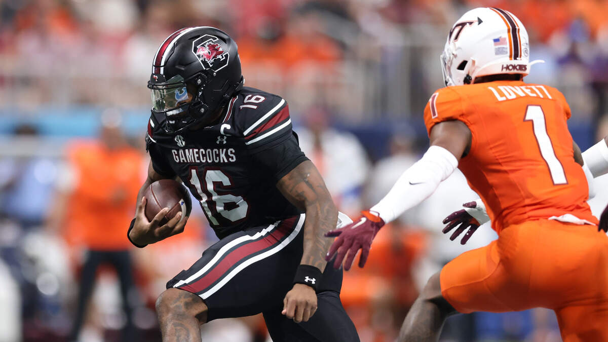 South Carolina quarterback LaNorris Sellers (16) carries the ball Sunday at Mercedes-Benz Stadium in Atlanta. The Gamecocks and Hokies faced off Aug. 31 in the 2025 Aflac Kickoff Game.