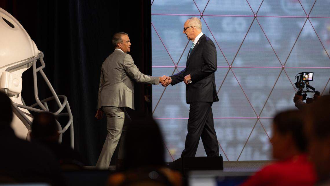 Jul 15, 2024; Dallas, TX, USA; South Carolina head coach Shane Beamer shaking hands with SEC commissioner Greg Sankey at Omni Dallas Hotel.