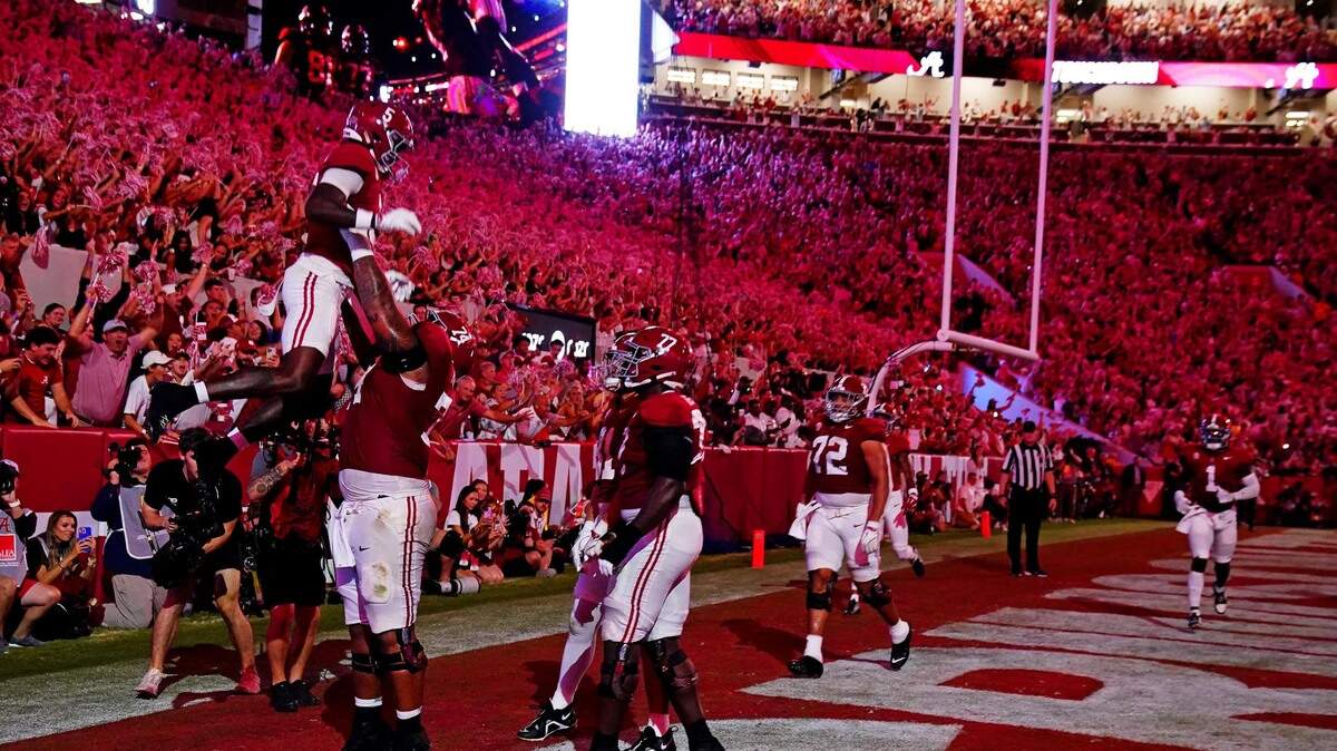 Sep 28, 2024; Tuscaloosa, Alabama, USA; Alabama Crimson Tide wide receiver Germie Bernard (5) celebrates after scoring a touchdown during the first quarter against the Georgia Bulldogs at Bryant-Denny Stadium. Mandatory Credit: John David Mercer-Imagn Images