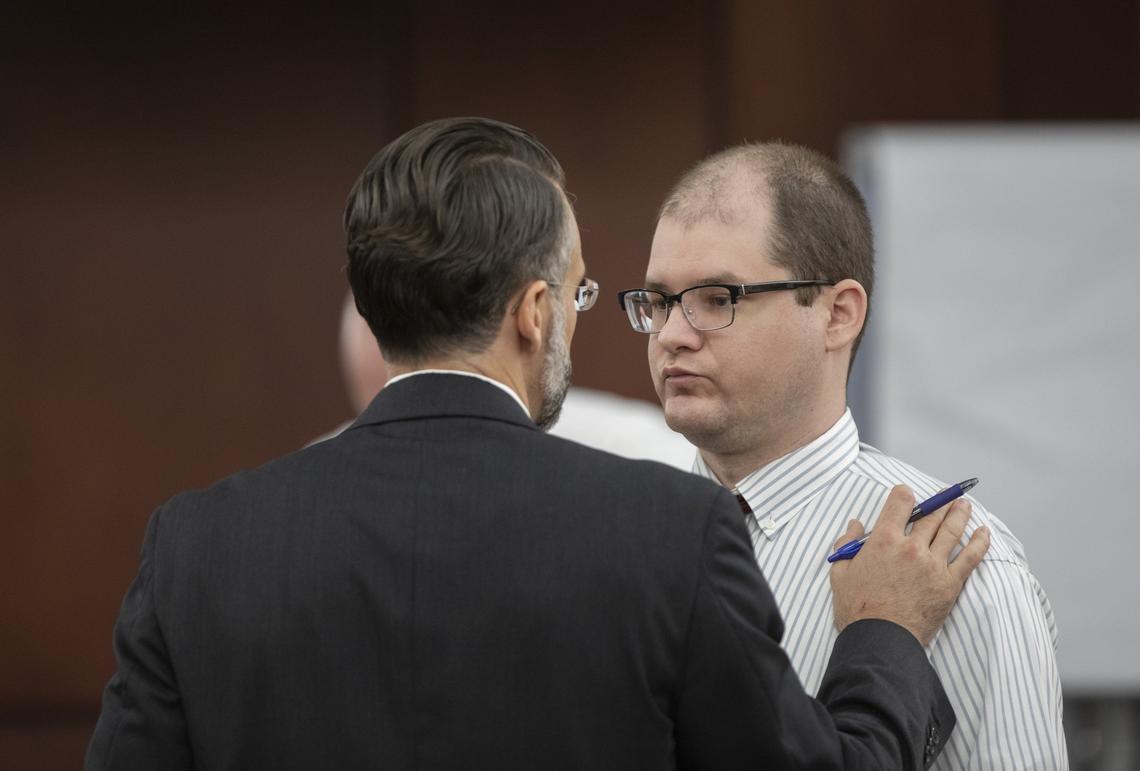 Defense attorney Casey Secor talks with Tim Jones during trial in Lexington. Timothy Jones, Jr. is accused of killing his 5 young children in 2014. Jones, who faces the death penalty, has pleaded not guilty by reason of insanity. 5/29/19