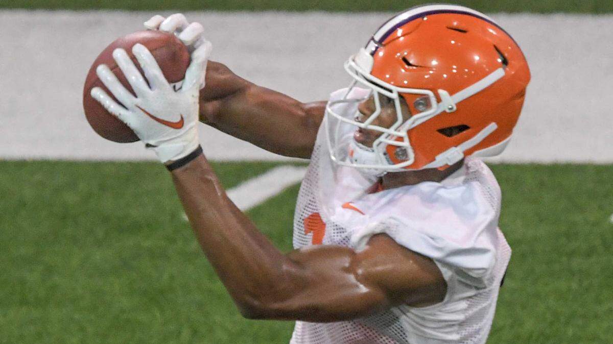 Clemson receiver Noble Johnson (3) catches a pass during preseason practice at the Poe Indoor Practice Facility at the Allen N. Reeves football complex in Clemson, S.C. Monday, August 7, 2023.