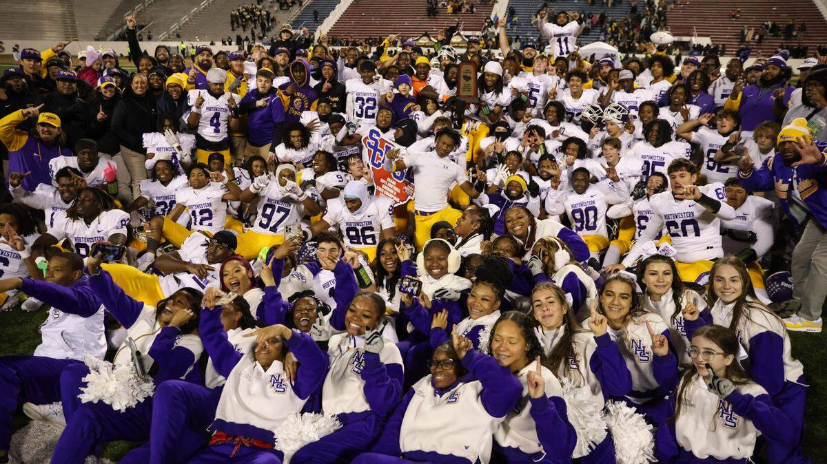 Northwestern players celebrate their win over Irmo in the Class 5A-D2 football state championship game at Oliver Dawson Stadium in Orangeburg on Saturday, December 14, 2024.