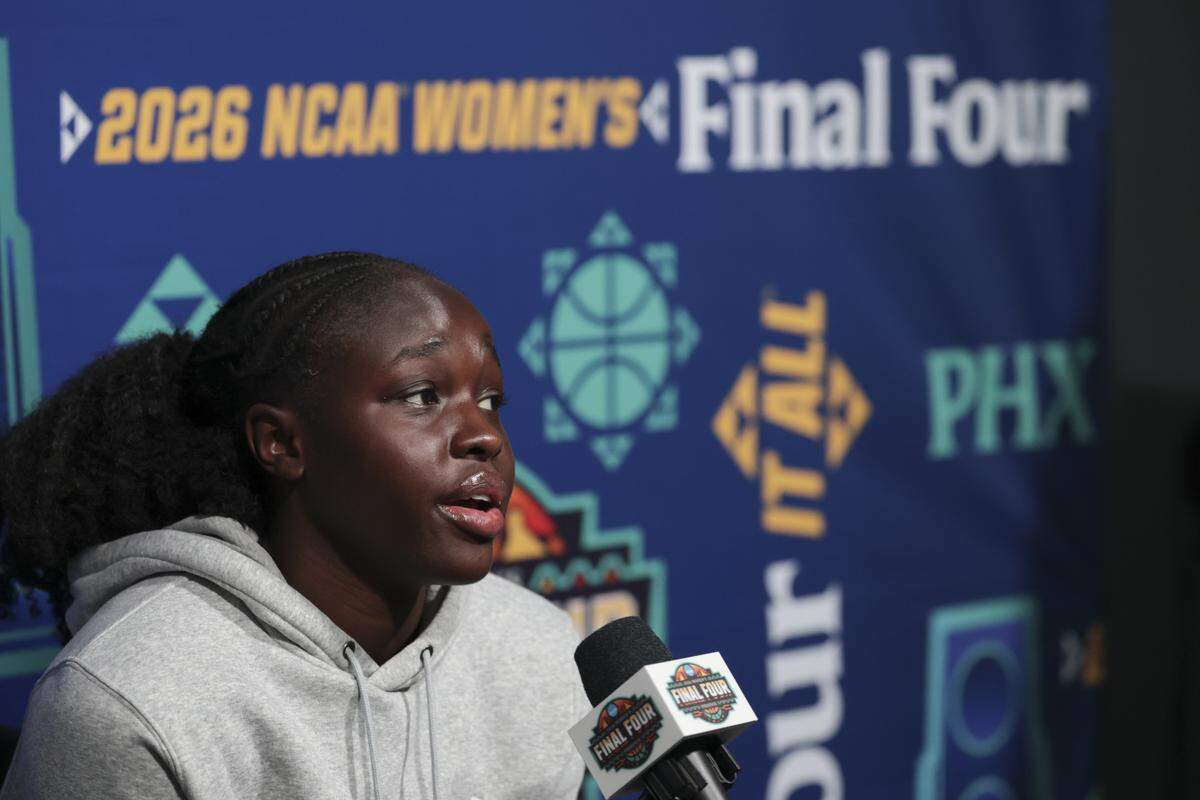 South Carolina's Agot Makeer addresses questions during a press conference on Saturday at Mortgage Matchup Center in advance of the National Championship matchup between South Carolina and UCLA in Phoenix on Sunday.