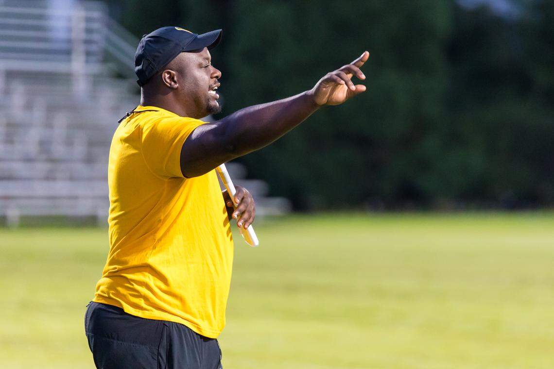 Spring Valley head football coach Norman Washington directs his team during practice.
