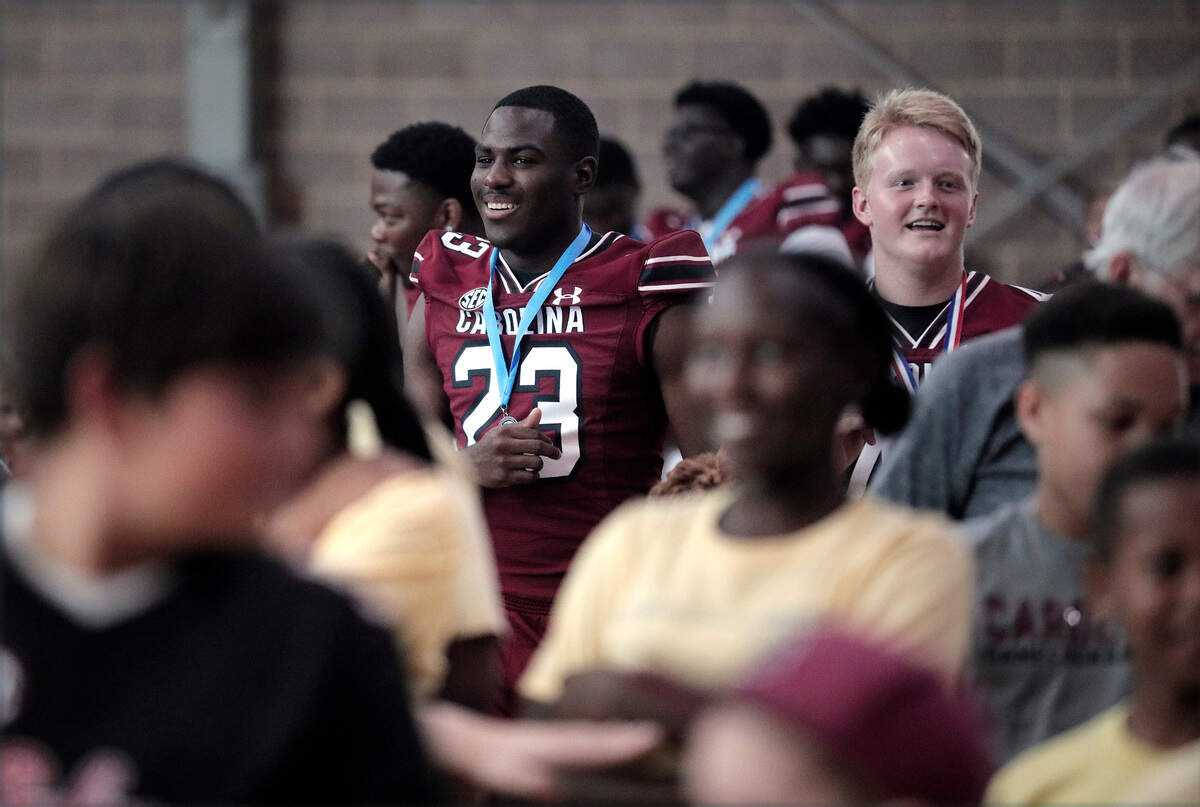 Djay Braswell and the University of South Carolina football team freshmen took part in the annual Pigskin Poets reading event Friday, July 21, 2023 at the Drew Wellness Center in Columbia.