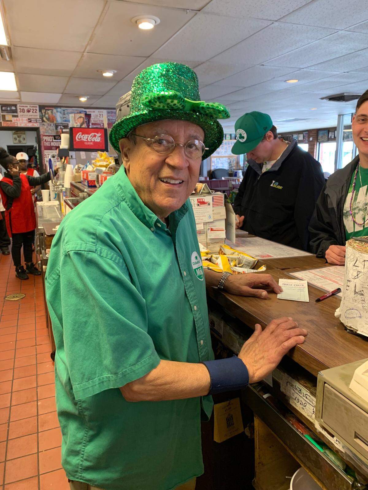 Andy Shlon, owner of Andy’s Deli, decked out for St. Patrick’s Day in 2017.
