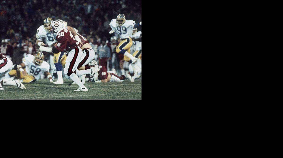 George Rogers runs in the Gator Bowl in December 1980.