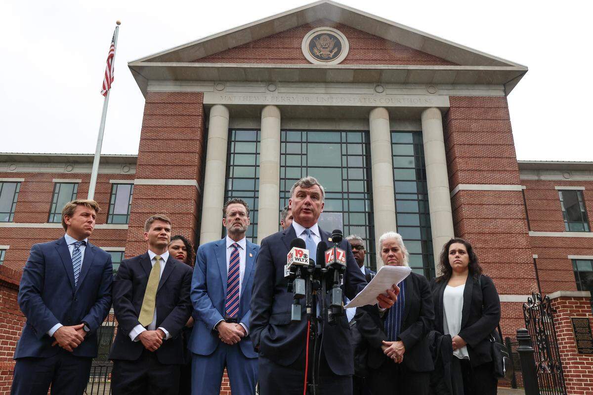 United States Attorney Bryan Stirling speaks outside the Matthew J. Perry Federal Courthouse in Columbia about the charges against R. J. May after a hearing where May pleaded guilty to five counts of distributing child pornography on Monday, Sept. 29, 2025.