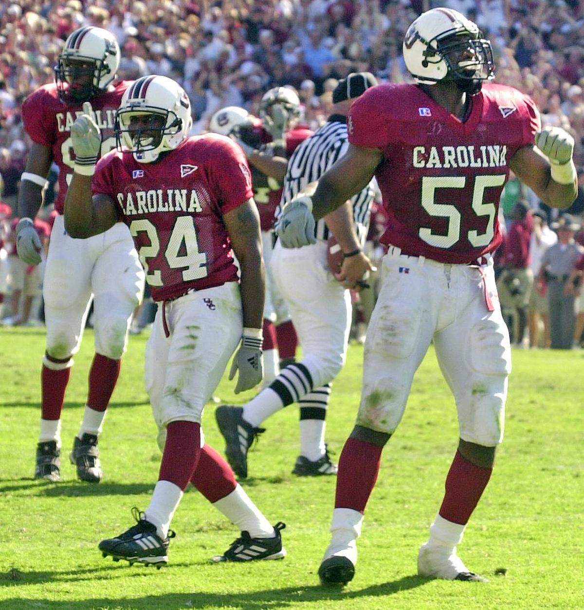 From Sept. 29, 2001: South Carolina defensive back Sheldon Brown (24) wags his finger at the Alabama sideline as USC linebacker Kalimba Edwards (55), right, pumps his fist as the USC defense stops Alabama on fourth down.