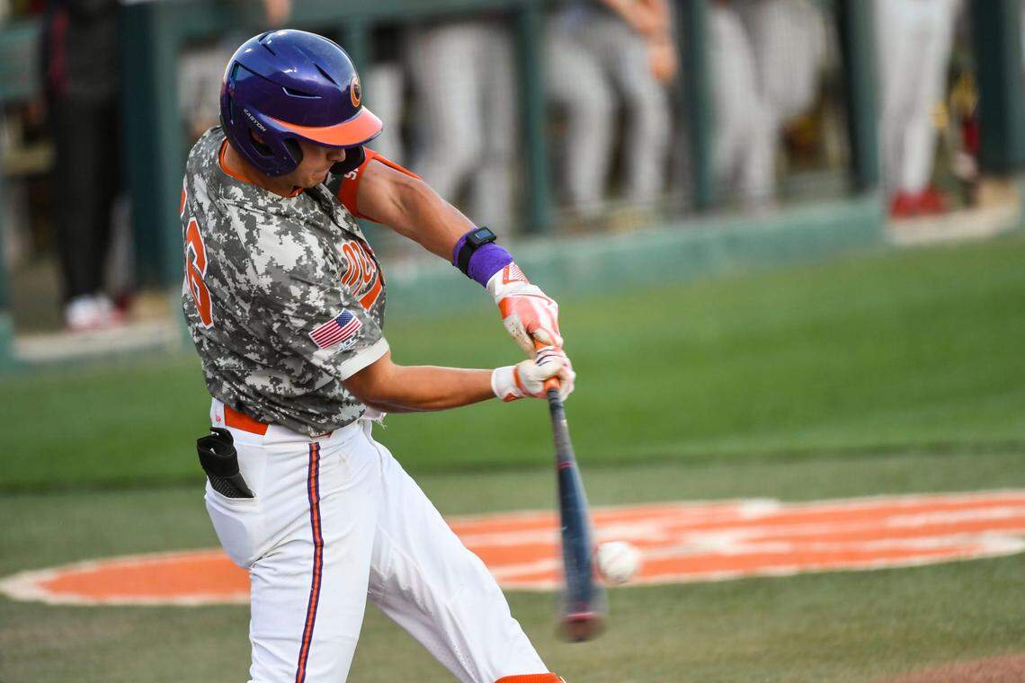 Clemson sophomore Will Taylor (16) gets a hit during a game against Georgia at Doug Kingsmore Stadium in Clemson Tuesday, April 18, 2023.