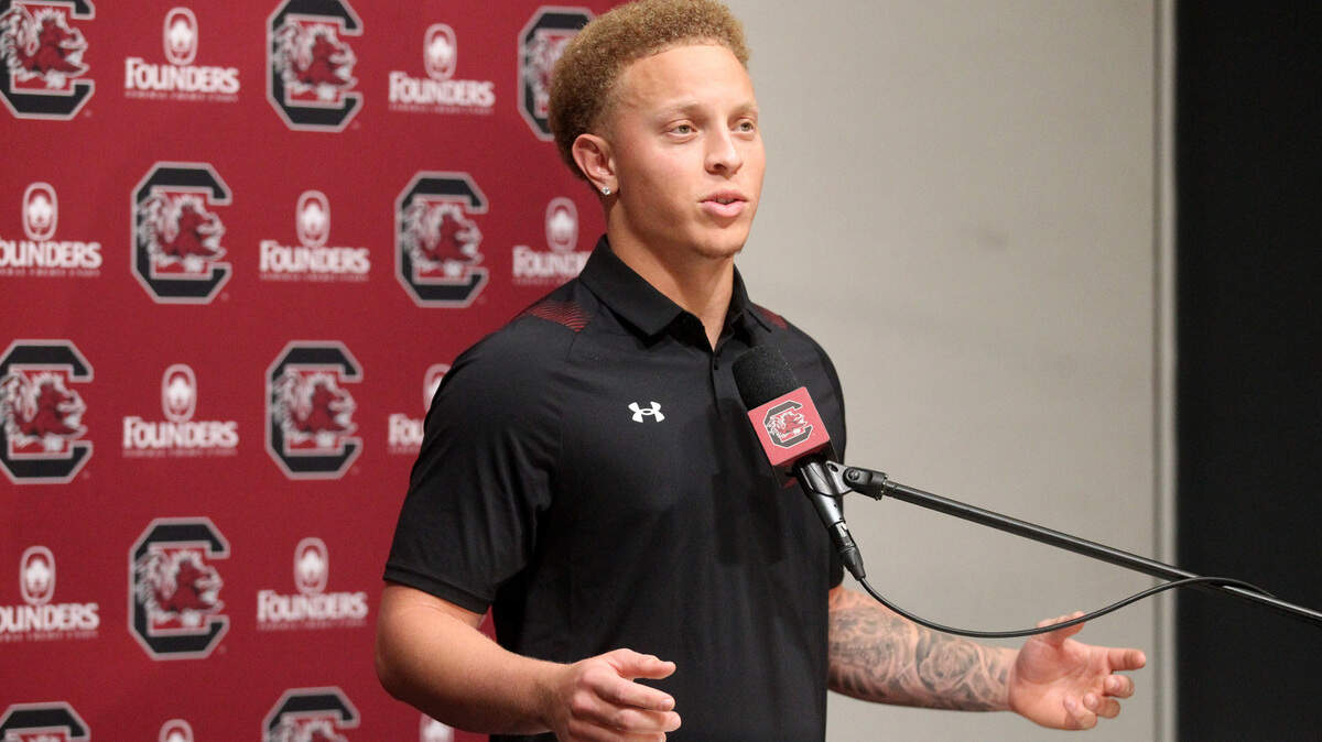Spencer Rattler speaks with reporters on Wednesday, March 2, 2022.