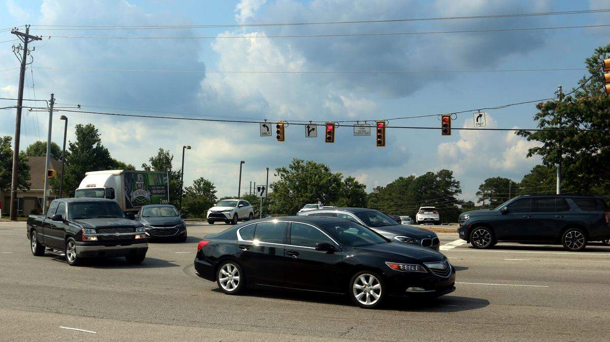 Traffic courses through the intersection of Corley Mill Road and Sunset Boulevard a little before 5 p.m. on June 17, 2024.