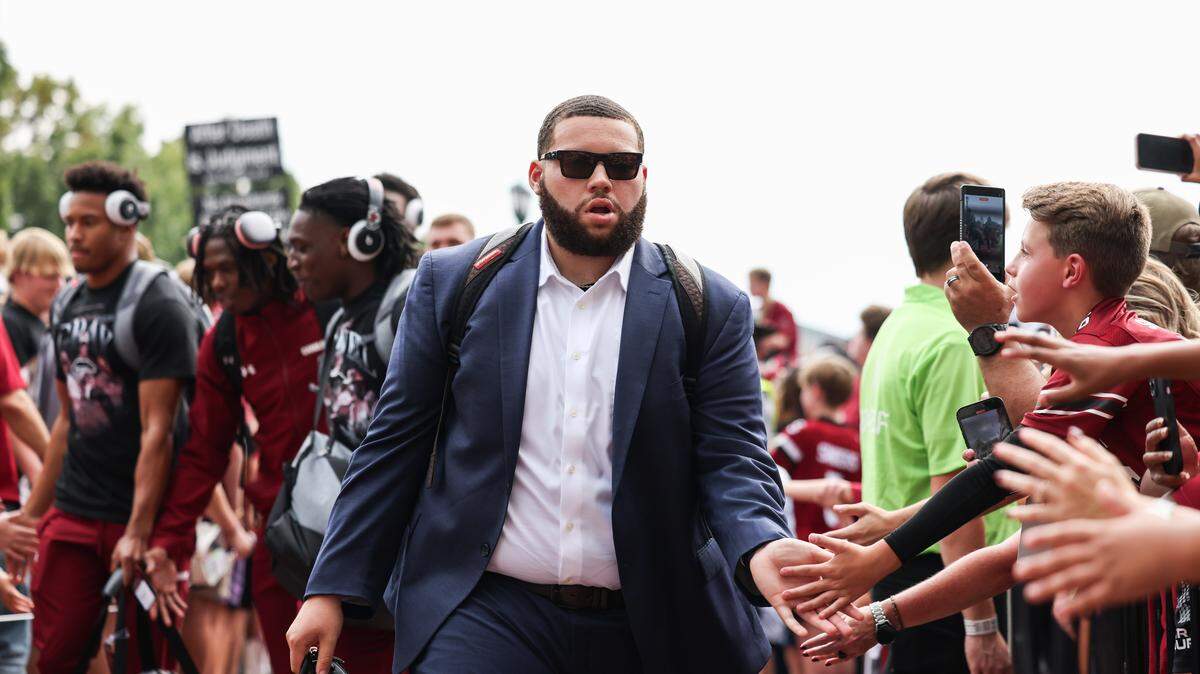 Jordan Dove is greeted by fans during the Gamecock Walk before the Gamecocks’ game against South Carolina State at Williams-Brice Stadium in Columbia on Saturday, September 6, 2025.