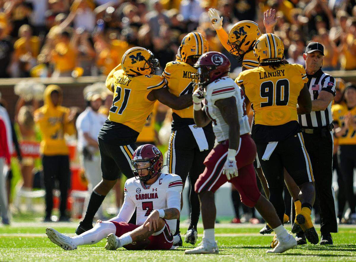 South Carolina Gamecocks quarterback Spencer Rattler (7) reacts after being sacked by the Missouri Tigers at Faurot Field at Memorial Stadium.