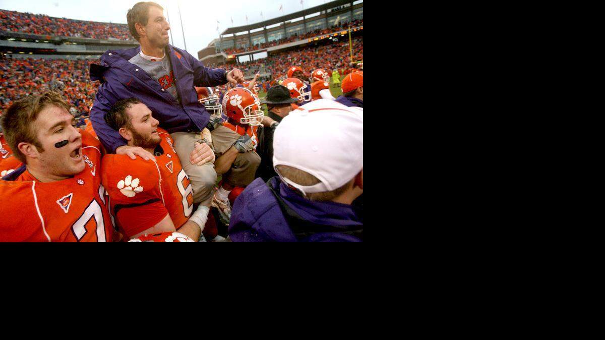  Interim head coach Dabo Swinney of Clemson is carried off the field by his players following the game.  Clemson won 31-14.