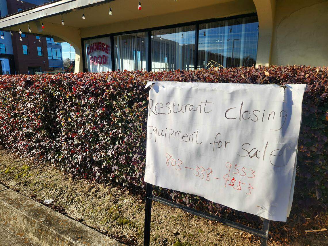 A sign outside Millennium Buffet at 409 Blossom St. in Columbia indicates the restaurant’s closure and that equipment is for sale.