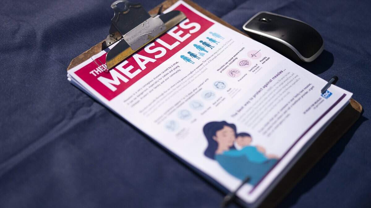 SPARTANBURG, SOUTH CAROLINA - FEBRUARY 6: A fact sheet for measles sits on a table at a mobile clinic offering free vaccinations on February 6, 2026 in Spartanburg, South Carolina. The clinic offered free MMR vaccinations as the South Carolina Department of Health reported 876 cases of measles earlier in the week, most centered in Spartanburg County. (Photo by Sean Rayford/Getty Images)
