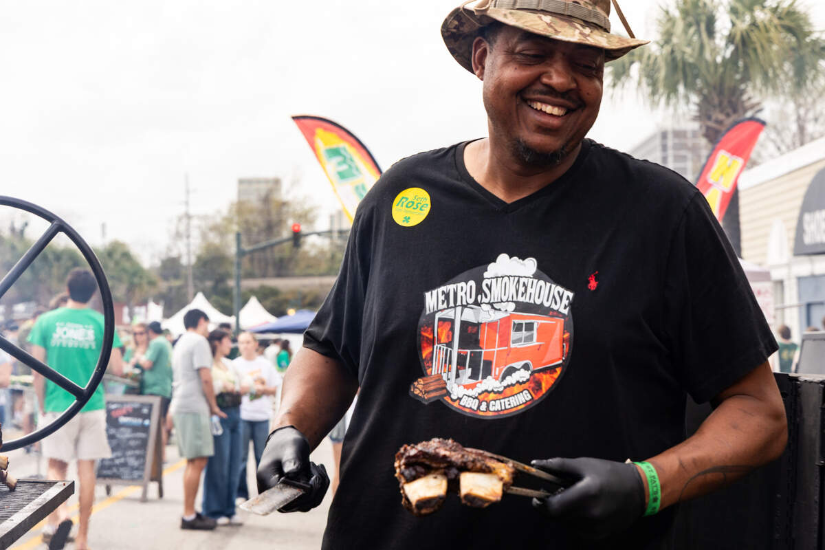 Metro Smokehouse serves up giant beef ribs during the St. Pat’s in Five Points festival in Columbia, South Carolina on Saturday, March 15, 2025.