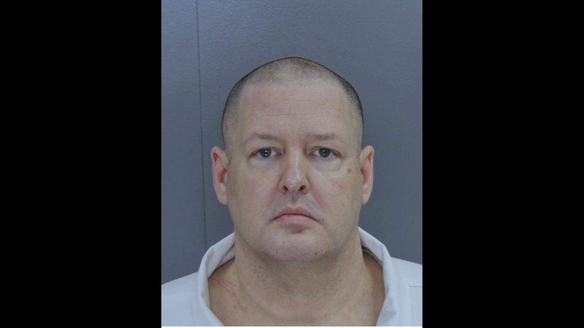 This photo provided by South Carolina state shows Todd Kohlhepp. New investigative videos released by prosecutors show the dramatic rescue of a woman who had been chained inside a metal storage container for about two months by Kohlhepp. The videos also show Kohlhepp confessing to killing seven people in South Carolina. He pleaded guilty two weeks ago to avoid the death penalty and was sentenced to life in prison. On Friday, prosecutors released several videos, dozens of pictures and hundreds of pages of evidence against him.