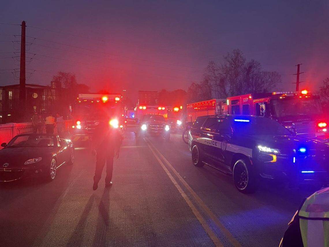 Members of the Columbia Police Department respond to a fatal crash on the Gervais Street bridge.