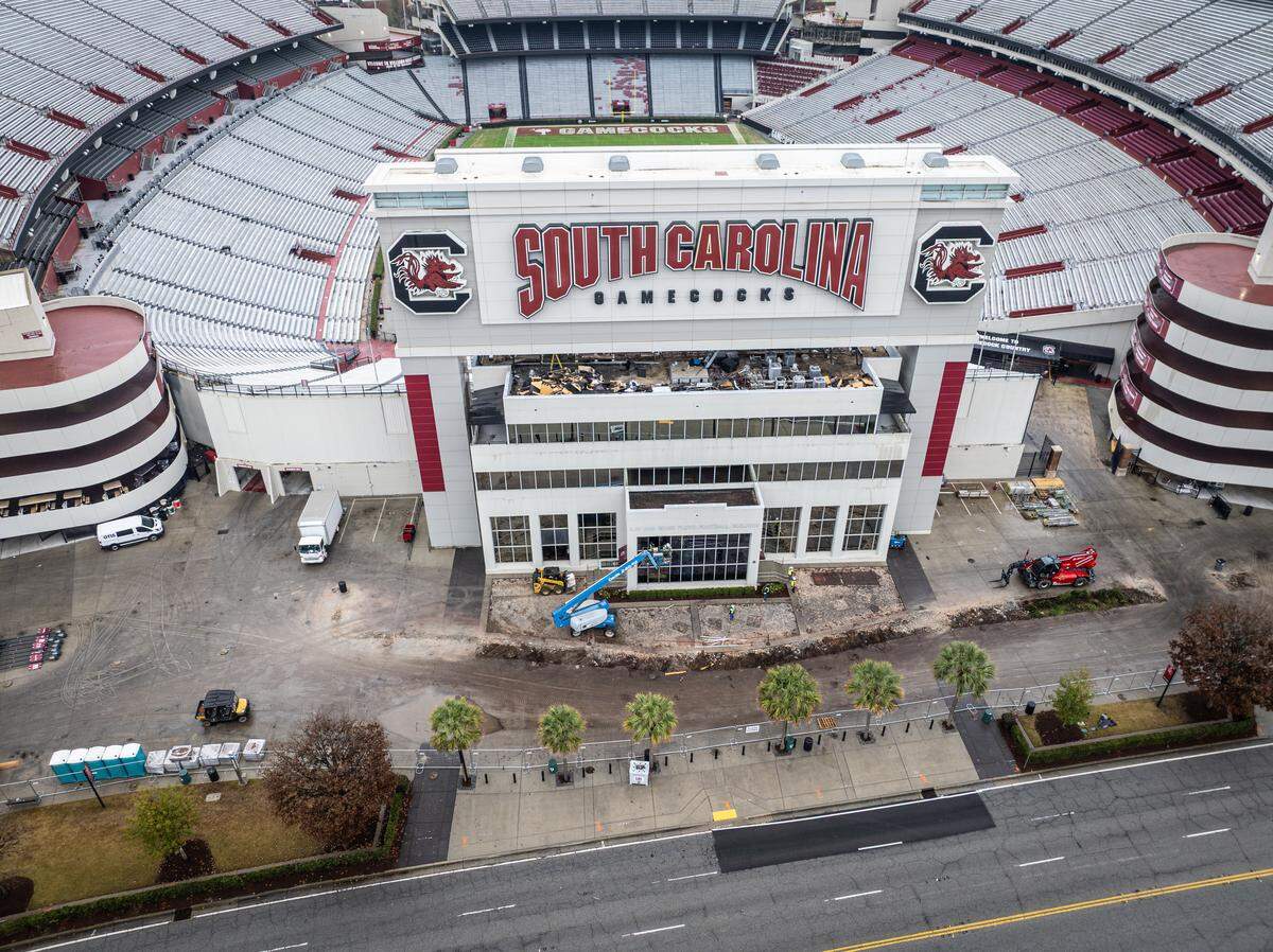Demolition work is under way at Williams-Brice Stadium to make way for upcoming renovations. Seen here: The Floyd Building is being demolished ahead of plans to enhance offerings for the student section. The videoboard and its structure will not be affected.