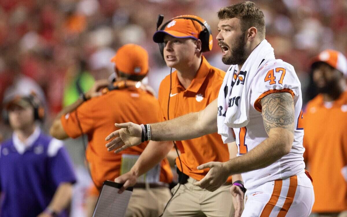 Clemson linebacker James Skalski (47), out with an injury, encourages his teammates during the second overtime period against N.C. State on Saturday September 25, 2021 at Carter-Finley Stadium in Raleigh, N.C.
