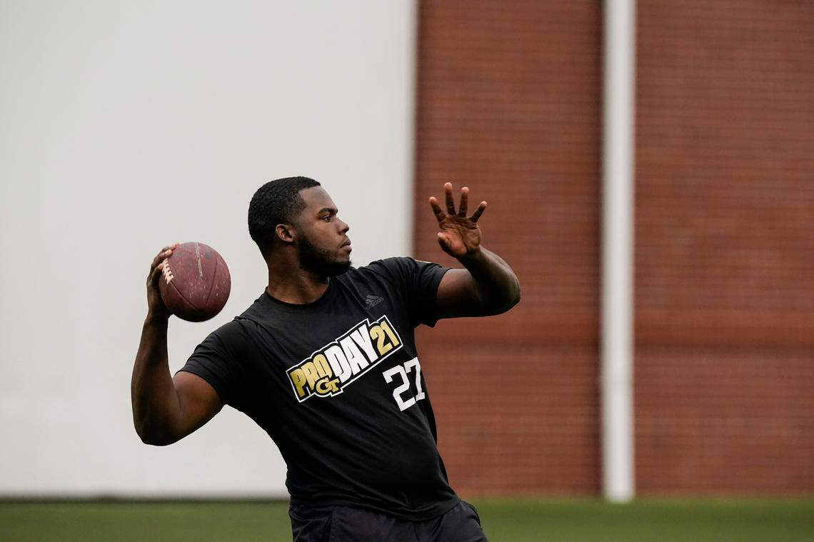 Georgia Tech punter Pressley Harvin III throws a pass during the school’s pro day football workout March 16 for NFL scouts in Atlanta. NFL scouts who gathered for Georgia Tech’s pro day to see Harvin boot the ball a mile and also asked him to throw some passes, and he dazzled them with his arm, too.