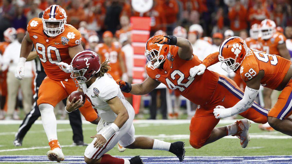 Clemson defensive linemen Dexter Lawrence (90), Christian Wilkins (42) and Clelin Ferrell (99) are projected to be first round picks in the 2019 NFL draft.