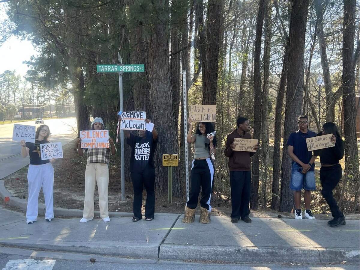 Parents and students protested outside a Lexington 1 school board meeting on March 9, 2026, after a board member criticized a Black History Month fashion show at River Bluff High School.