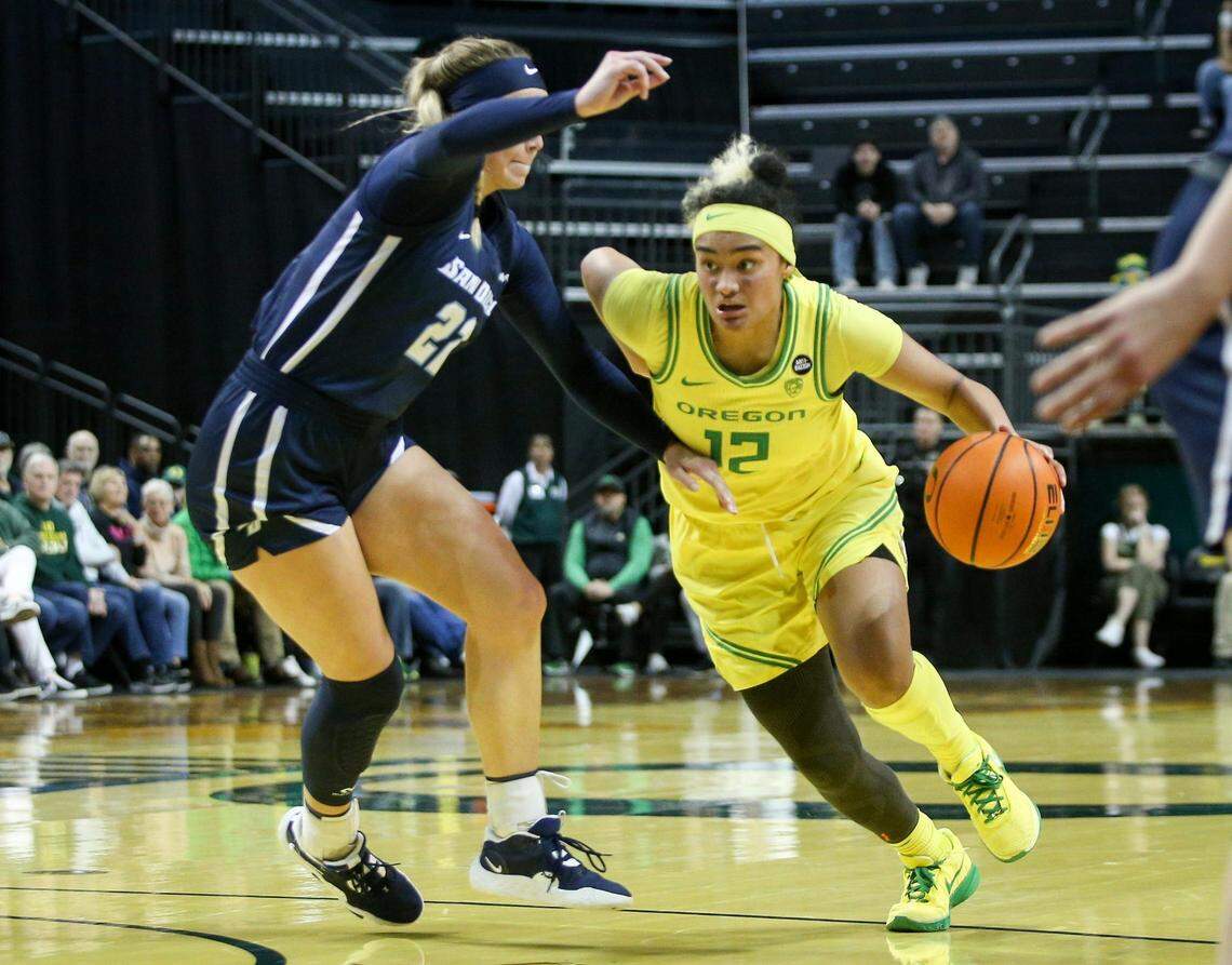 Oregon guard Te-Hina Paopao pushes toward the basket as the Oregon Ducks host San Diego in a WNIT matchup Thursday, March 23, 2022, at Matthew Knight Arena in Eugene, Ore.