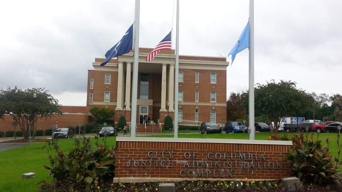 This file photo shows flags being flown at half staff, which S.C. Gov. Henry McMaster has ordered following the death of Florence County Sheriff’s Deputy Farrah Turner.