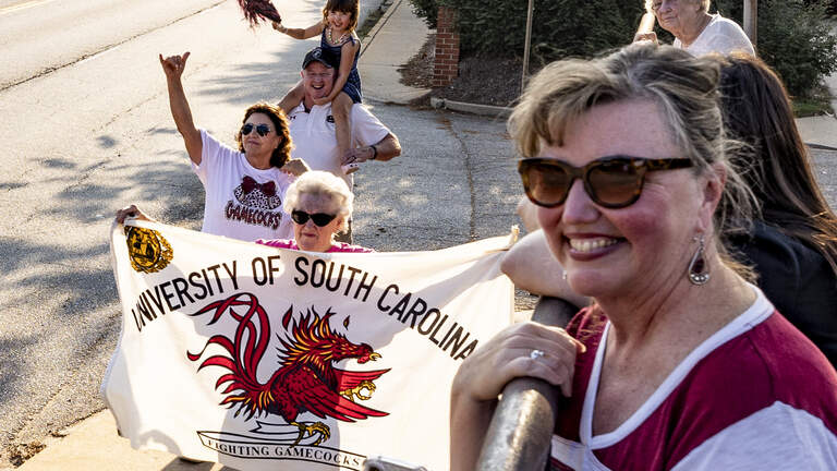 For nearly 50 years, one family has waved to USC’s buses. Shane Beamer noticed