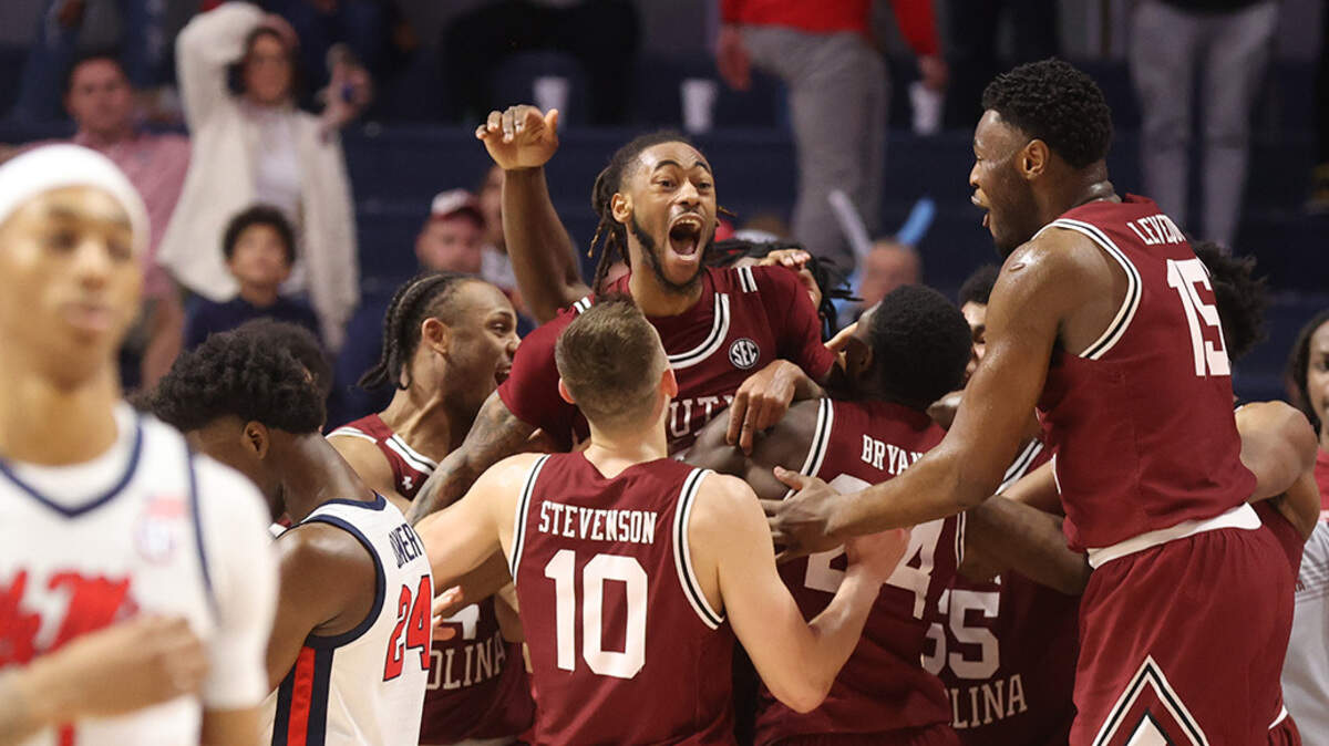 South Carolina celebrates James Reese’s game-winning shot Tuesday night against Ole Miss.