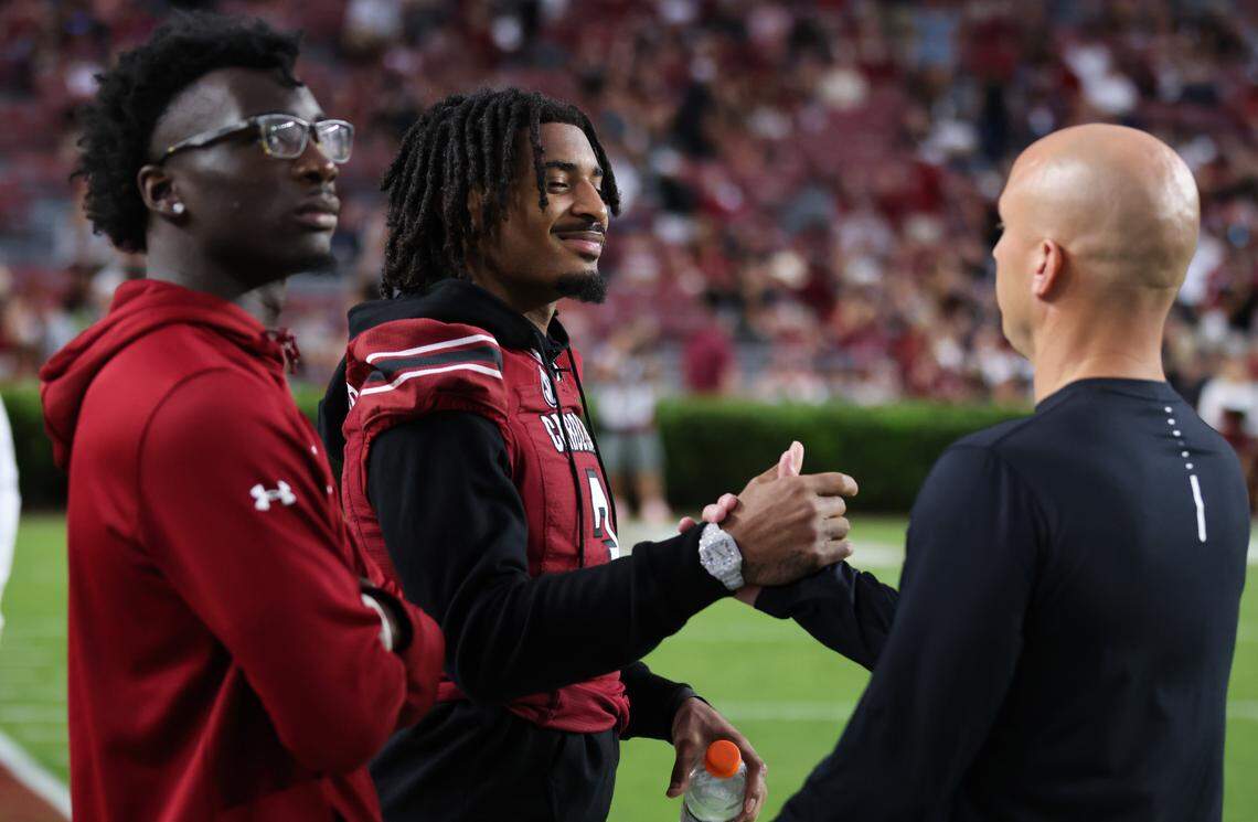 South Carolina wide receiver Antwane Wells Jr. (3) speaks with wide receivers coach Justin Stepp during warmups before the Gamecocks’ game at Williams-Brice Stadium in Columbia on Saturday, September 23, 2023.