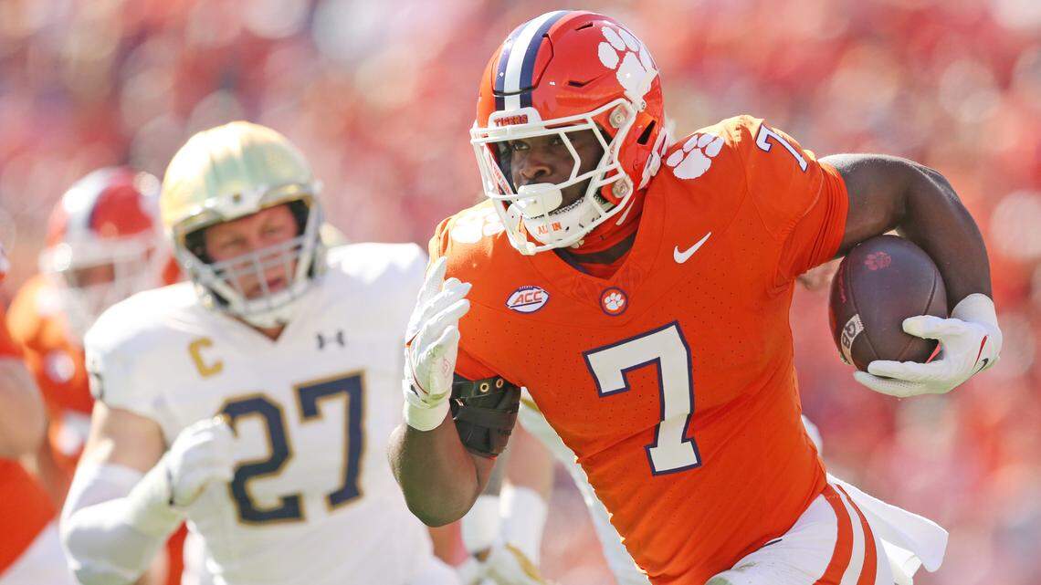 Clemson running back Phil Mafah (7) runs for at touchdown in front of Notre Dame linebacker JD Bertrand (27) during first-half action in Clemson, S.C. on Saturday, Nov. 4, 2023. (Travis Bell/SIDELINE CAROLINA)