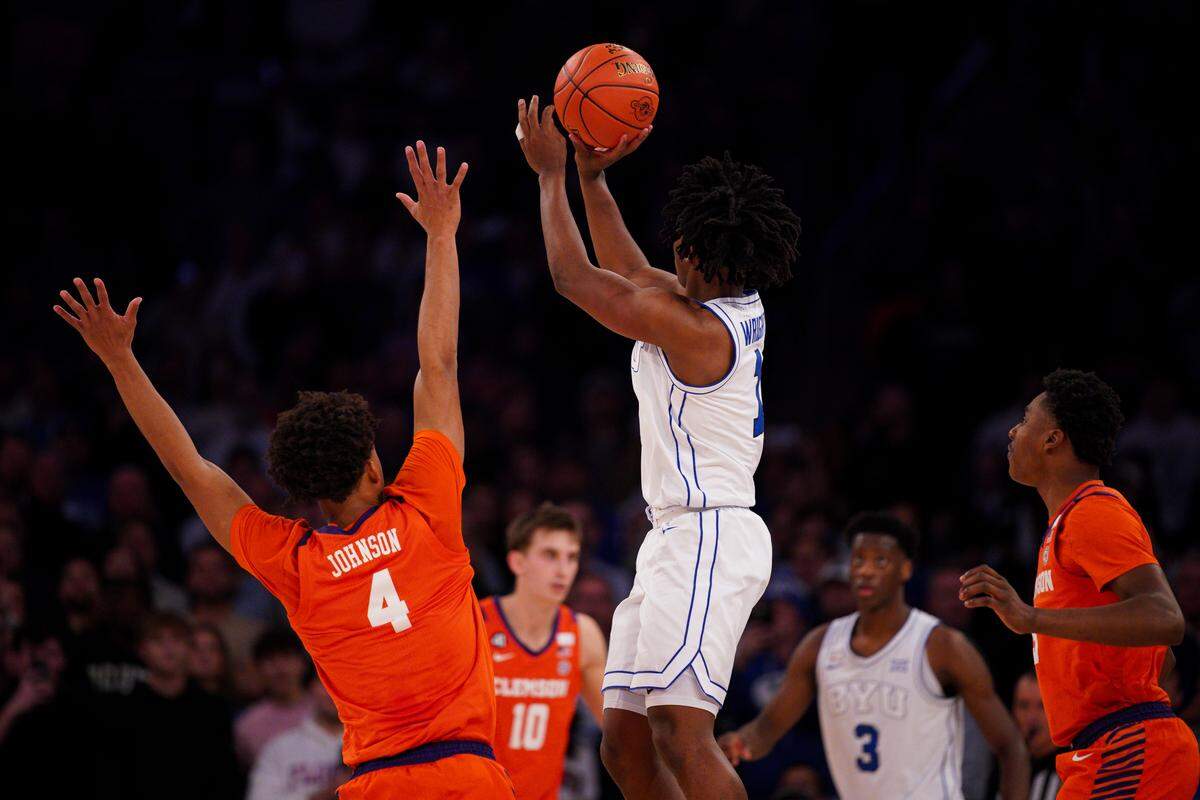 BYU guard Robert Wright III ended Clemson’s New York trip on a sour note when he caught an inbounds pass with 1.1 seconds left and sank a buzzer-beating 3-pointer over two Clemson defenders to secure a wild comeback win.