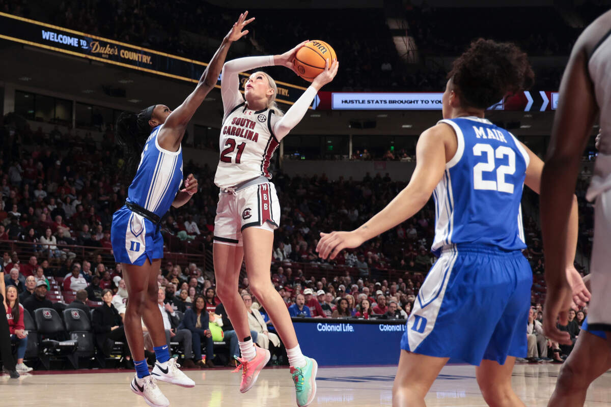 University of South Carolina forward Chloe Kitts (21) shoots over Duke University’s Oluchi Okananwa (5) during the first half of action in the Colonial Life Arena on Thursday Dec. 5, 2024.