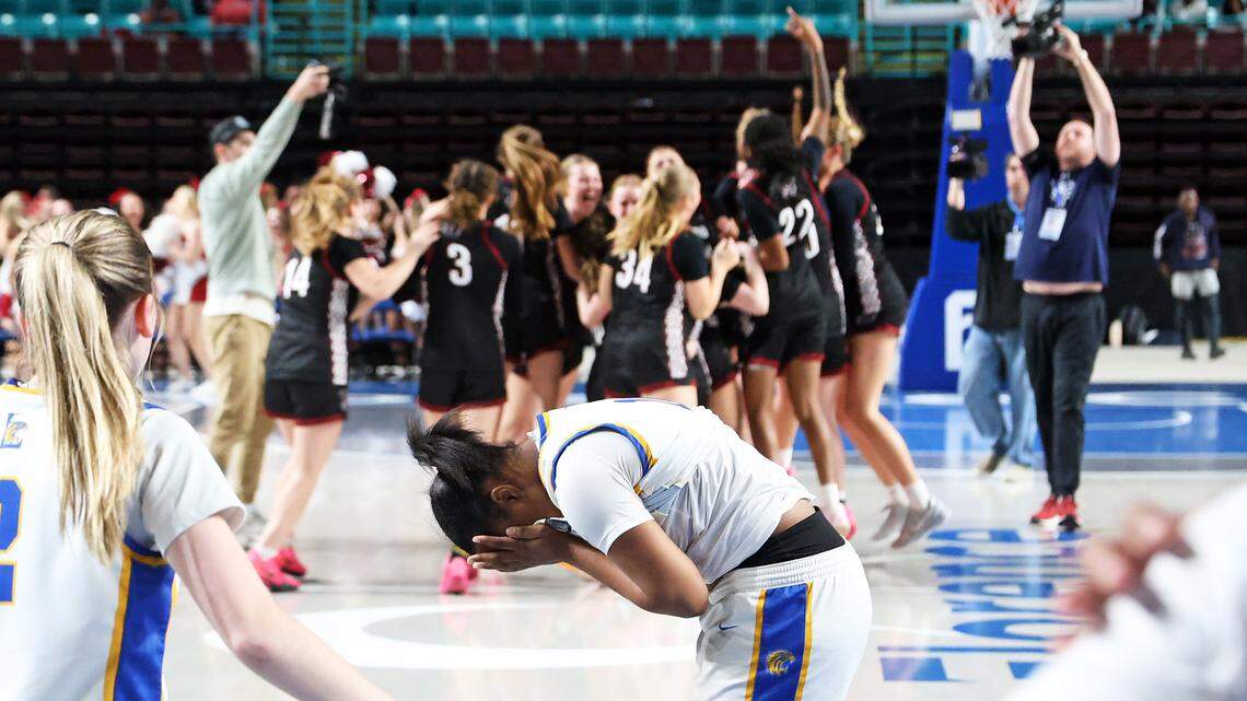 Lexington High School players react after a last-second loss to Wando in Saturday’s Class 5A girls Lower State championship game at the Florence Center.