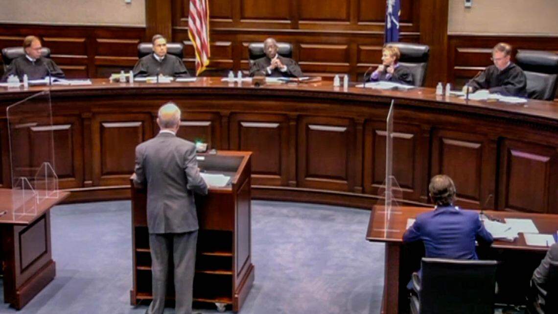 Deputy Solicitor General Emory Smith, Jr. presents his case to, members of the South Carolina Supreme Court as seen in video feed from the hearing.