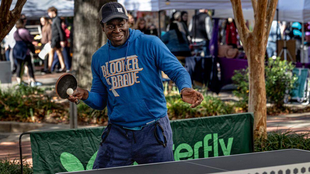 Komi Tepe plays ping pong at the new outdoor table in downtown Columbia. The table has been added to the pocket park next to the Tapp’s building in downtown Columbia.