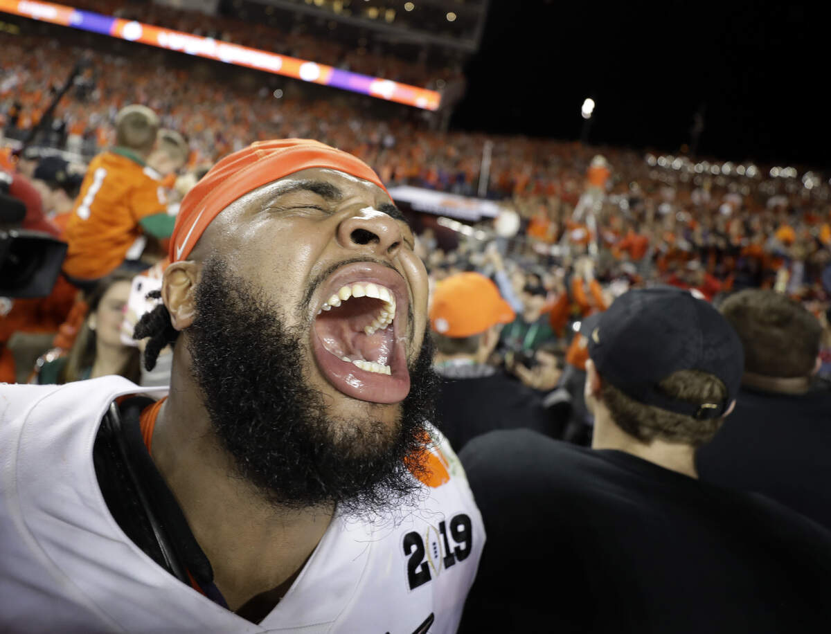 An emotional Christian Wilkins celebrates after Clemson defeated Alabama in the national championship game.