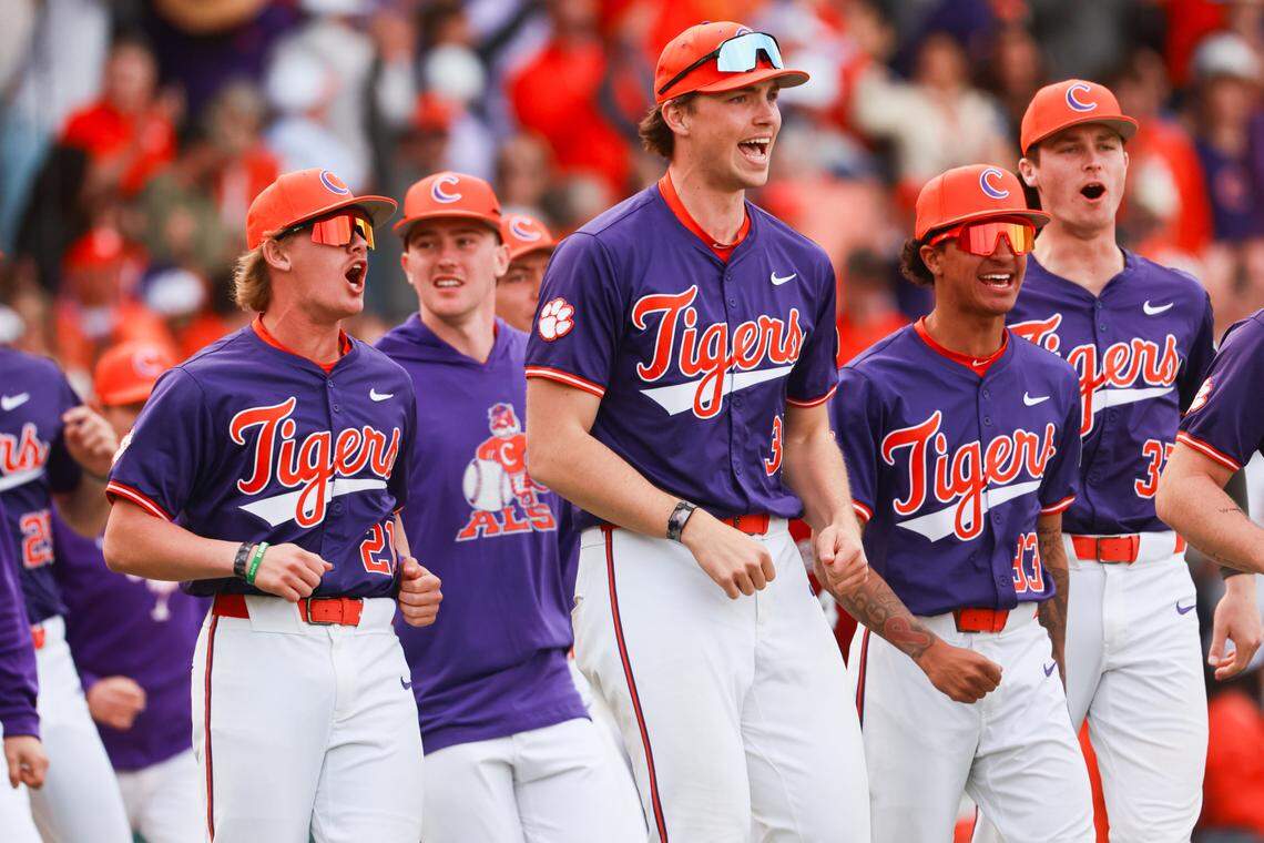 Clemson celebrates beating South Carolina at Fluor Field in Greenville, South Carolina on Saturday, March 1, 2025.