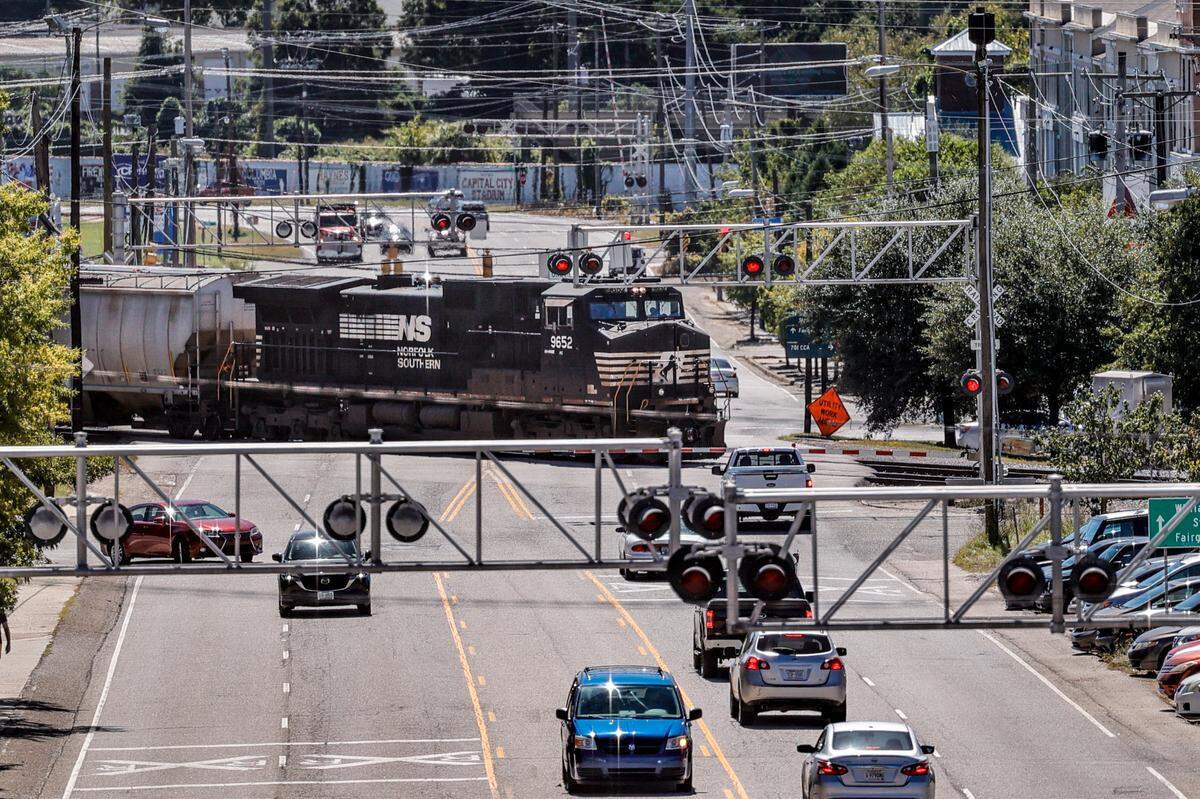 A train crosses Assembly Street near Whaley Street at one of the 15 railroad crossings on the main Columbia thoroughfare.