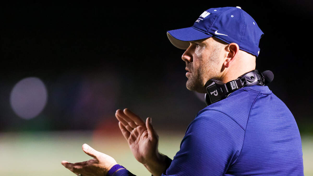 Dorman Cavaliers head coach Dustin Curtis, former head coach at AC Flora, directs his team against the Dutch Fork Silver Foxes during their game at Dutch Fork High School during round two of the playoffs Friday, Nov. 11, 2022.