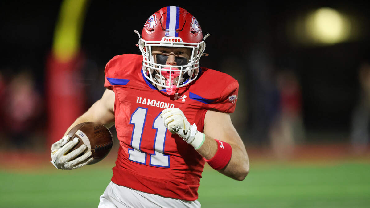 Jackson Ross (11) of Hammond carries the ball during Hammond’s game against Heathwood Hall at Hammond on Friday, Nov. 14, 2025.
