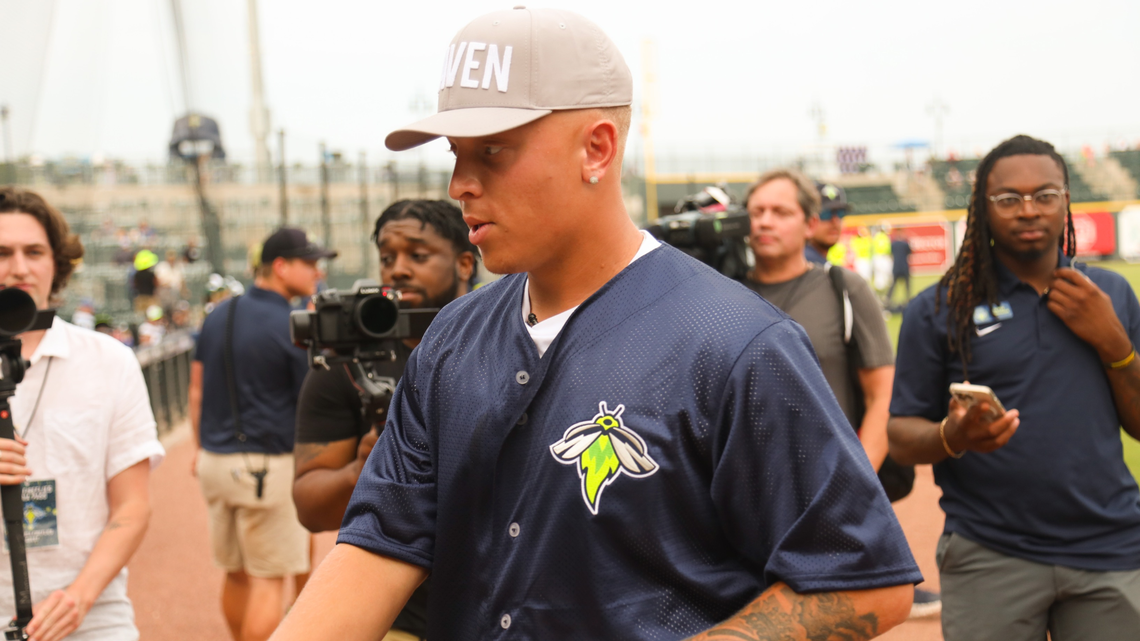 Gamecocks quarterback Spencer Rattler threw out the first pitch at the Columbia Fireflies game on Thursday night at Segra Park. He also signed autographs for USC fans.